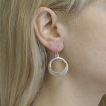 M Baer Cutout Disc Earring